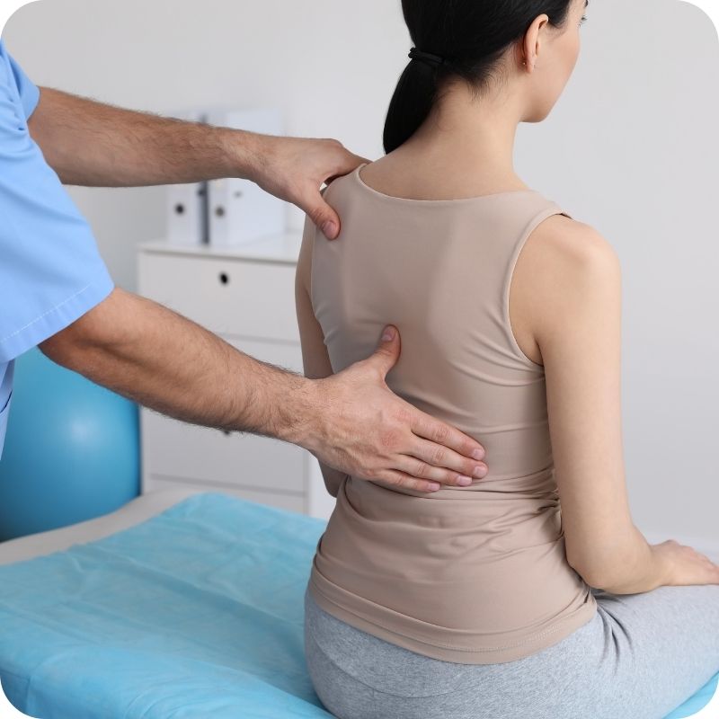 family with children at preventive eye consultation, ophthalmologist explaining eye care, relaxed atmosphere